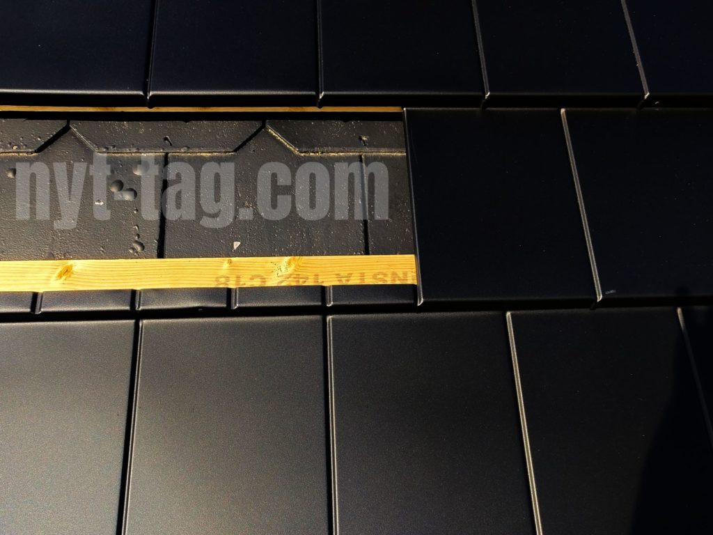 Metrotile Qube lagt ovenpå eksisterende eternitskifer tag